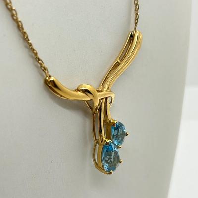 LOT 13: 14K Yellow Gold 17.5" Necklace with Blue Topaz Rhinestone Pendant - 10.8 GTW