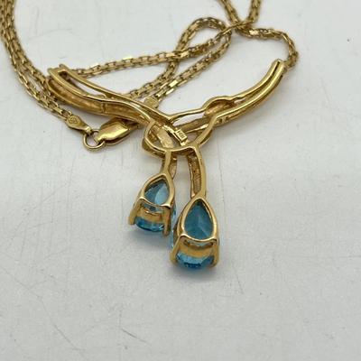 LOT 13: 14K Yellow Gold 17.5" Necklace with Blue Topaz Rhinestone Pendant - 10.8 GTW