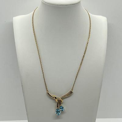 LOT 13: 14K Yellow Gold 17.5" Necklace with Blue Topaz Rhinestone Pendant - 10.8 GTW