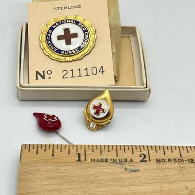 LOT 26: Vintage Red Cross Pins - One is Sterling and still in the package!