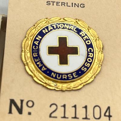 LOT 26: Vintage Red Cross Pins - One is Sterling and still in the package!