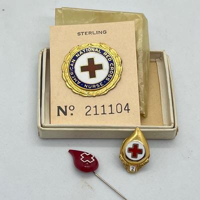 LOT 26: Vintage Red Cross Pins - One is Sterling and still in the package!