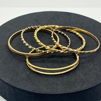 LOT 32: Gold Toned Bangle Bracelets - Monet and More!