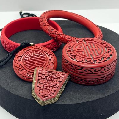 LOT 47: Vintage Carved Chinese Cinnabar Bracelets, Medallion, Pin and Trinket Box