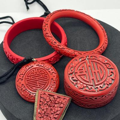 LOT 47: Vintage Carved Chinese Cinnabar Bracelets, Medallion, Pin and Trinket Box