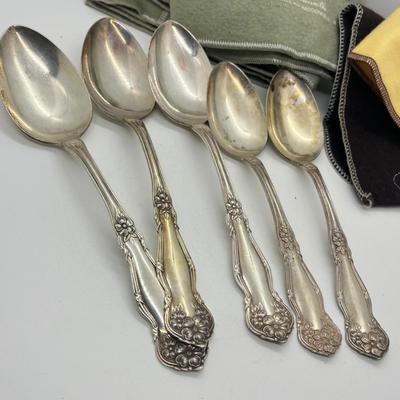 LOT 55: Silver Plated Flatware Pieces with Silver Protectors