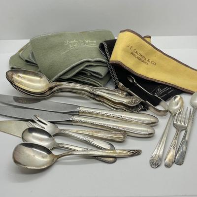 LOT 55: Silver Plated Flatware Pieces with Silver Protectors