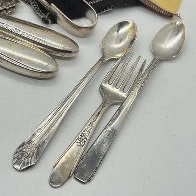 LOT 55: Silver Plated Flatware Pieces with Silver Protectors