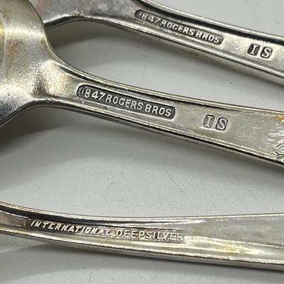 LOT 55: Silver Plated Flatware Pieces with Silver Protectors