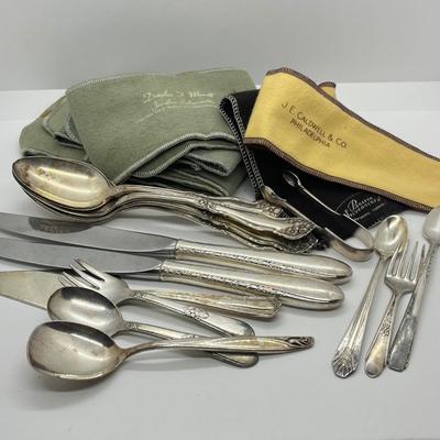 LOT 55: Silver Plated Flatware Pieces with Silver Protectors