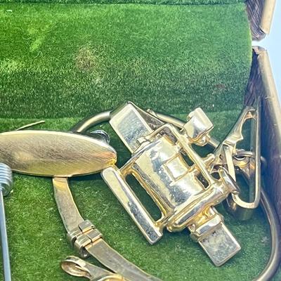 LOT 56: Men's Jewelry Lot Including Sterling Tie Clip (4.6 Grams) and 10K Pin (2.3 Grams)