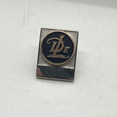 LOT 56: Men's Jewelry Lot Including Sterling Tie Clip (4.6 Grams) and 10K Pin (2.3 Grams)