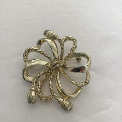 Sale Photo Thumbnail #150: Vintage gold tone, broach by star please see attached photos