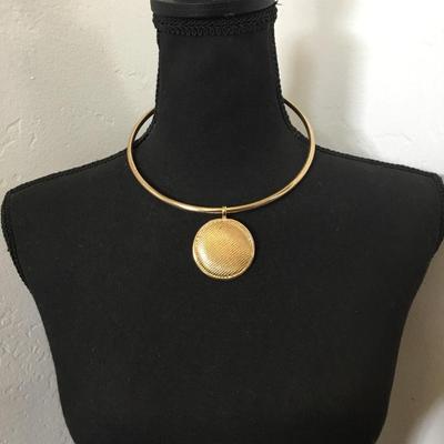 Monet Gold tone collar necklace with circular pendant