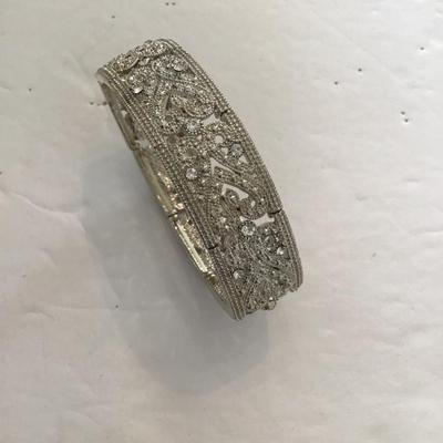 Sale Photo Thumbnail #182: Very nice Silvertone clear rhinestone stretch bracelet. Please see attached photos.