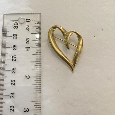 Sale Photo Thumbnail #190: Goldtone heart brooch. Please see attached photos.