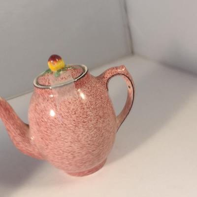 Sale Photo Thumbnail #721: Pair of Homestead Ware England Porcelain Teapots.  One has chip on spout.