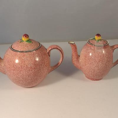 Sale Photo Thumbnail #719: Pair of Homestead Ware England Porcelain Teapots.  One has chip on spout.
