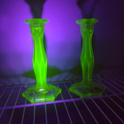 Sale Photo Thumbnail #740: Pair of Uranium Glass Candle Stick Holders- Approx 8 1/2" Tall