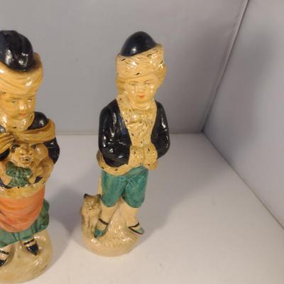 Sale Photo Thumbnail #766: Pair of Vintage Pottery Figurines