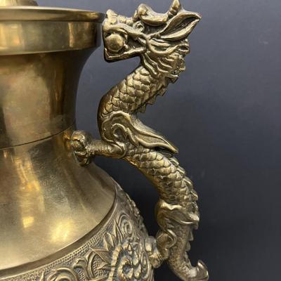 Sale Photo Thumbnail #324: Beautiful Asian brass lamps with dragon handles and intricate repousse' design.  1960s
14 inches  x 29 3/4 inches 
retail    $850 to $1600 each