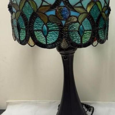 Sale Photo Thumbnail #326: TIffany style glass drum shade lamp.  Corded, bronze bases.  
The oval shape shade has 300 glass pieces.  
12 x 12 x 21 inches . excellent condition.
