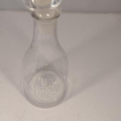 Sale Photo Thumbnail #789: Art Glass Decanter with Stopper.  Item has chipping on stopper- please see all pictures for condition.