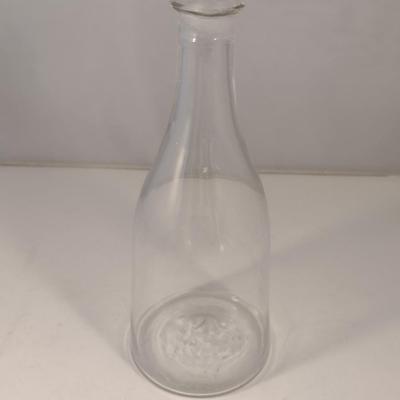 Sale Photo Thumbnail #793: Art Glass Decanter with Stopper.  Item has chipping on stopper- please see all pictures for condition.