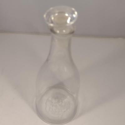 Sale Photo Thumbnail #790: Art Glass Decanter with Stopper.  Item has chipping on stopper- please see all pictures for condition.