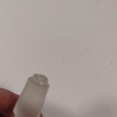 Sale Photo Thumbnail #792: Art Glass Decanter with Stopper.  Item has chipping on stopper- please see all pictures for condition.