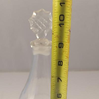 Sale Photo Thumbnail #805: Art Glass Decanter with Stopper- Etched Dainty Design- Approx 10 3/4" Tall.  Stopper has chipping.