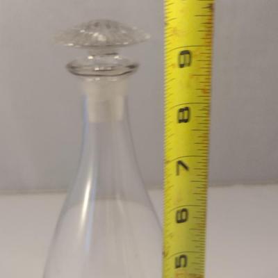 Sale Photo Thumbnail #811: Glass Decanter with Stopper- Approx 9 5/8" Tall.  Stopper has some chipping.