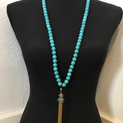 Faux turquoise stone bead, long necklace with vintage gold tone, tassel pendant