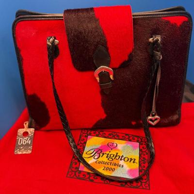 Sale Photo Thumbnail #343: Collectible Calf Hair Bag, black and red, slight wear upper left corner
Includes dust bag, 
retails $159 to $209
11 x 13 inches, 1 interior zipper, 1 exterior slot
2 handles