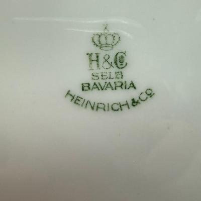 Sale Photo Thumbnail #344: 2 Hutschenreuther Selb 10.75 inch plates
9 Heinrich & Co 10.75 inch plates
Vintage, from the 1930s
Retails at $50 to $95 per plate
Excellent condition, pre-owned 
These would be beautiful chargers for your depression glass dishes.
Local pickup only