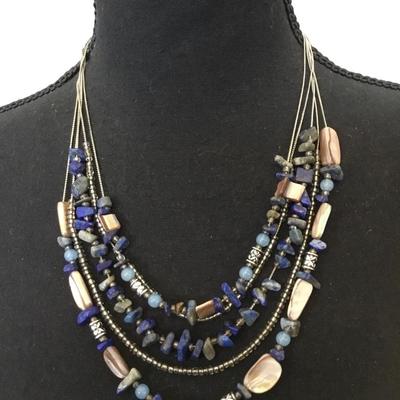 Beautiful, silver toned, multistrand, lapis, and shell bead statement necklace