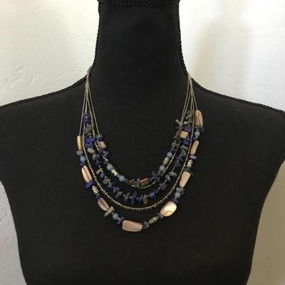 Beautiful, silver toned, multistrand, lapis, and shell bead statement necklace