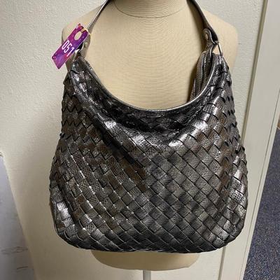 Sale Photo Thumbnail #354: Grey woven leather Newbury Hobo
2 interior pockets
1 interior zipper pocket