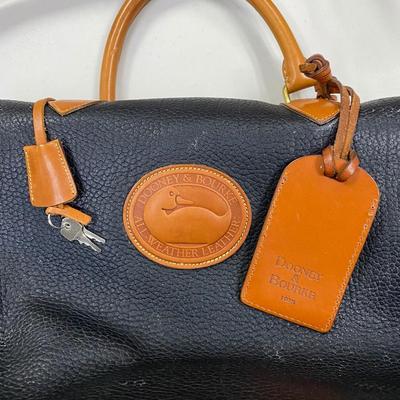 Sale Photo Thumbnail #366: 4 internal pockets
1 internal zipper pocket
2 handles and 1 shoulder strap
Brown all weather leather
Lock with keys
retail $540
very good condition 
12 inches tall x 17 inches wide  by 9.5 inches deep