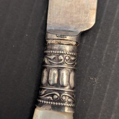 Sale Photo Thumbnail #3242: Some of the utensils have some damage