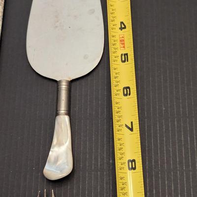 Sale Photo Thumbnail #3246: Some of the utensils have some damage