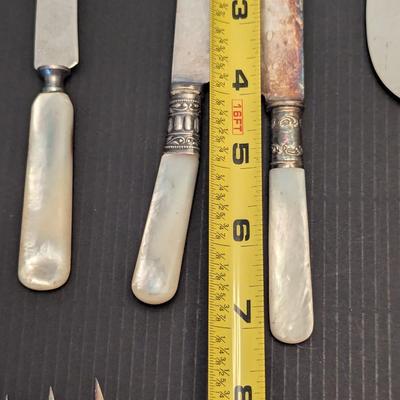 Sale Photo Thumbnail #3245: Some of the utensils have some damage