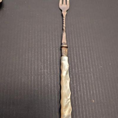 Sale Photo Thumbnail #3234: Some of the utensils have some damage