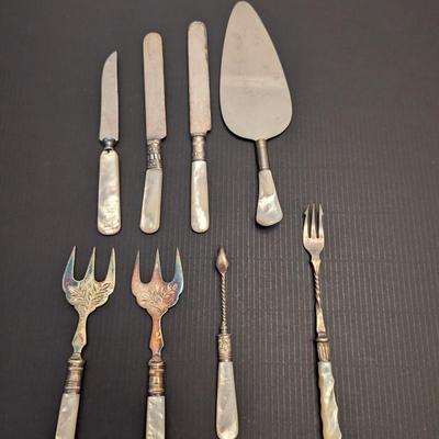 Sale Photo Thumbnail #3231: Some of the utensils have some damage