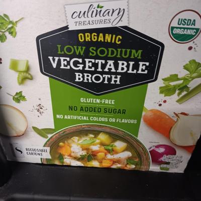 CASE OF ORGANIC VEGETABLE BROTH AND A CASE (MINUS 1 CAN) OF DICED TOMATOES