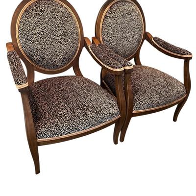 Pair of French style open arm chairs in leopard print velvet