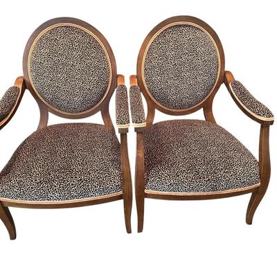 Pair of French style open arm chairs in leopard print velvet