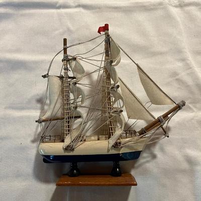 Sale Photo Thumbnail #250: Wooden Model of the Nantucket Sailing Ship With Fabric Sails   9" Long  9" Tall