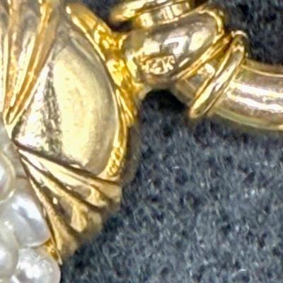 Sale Photo Thumbnail #58: 8-strand freshwater seed pearl necklace with a 14K gold clasp. Clasp is marked "ADPG" and "14K". Overall necklace weight is 55g.  Excellent condition.