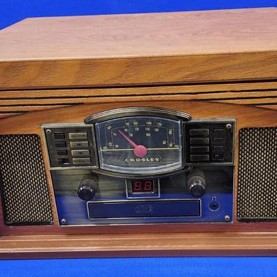 Sale Photo Thumbnail #380: Retro all in one music system.
3 speed turntable   33  45  78  
CD player, cassette payer
AM  FM  radio
built in Bluetooth receiver for streaming 
NEW